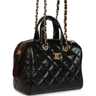 Chanel Pre-owned Chanel "CC Travel" Bowling Bag Black Shiny Crumped Calfskin Antique Gold Hardware | Thumbnail 2 Chanel Pre-owned Chanel "CC Travel" Bowling Bag Black Shiny Crumped Calfskin Antique Gold Hardware | Thumbnail 2