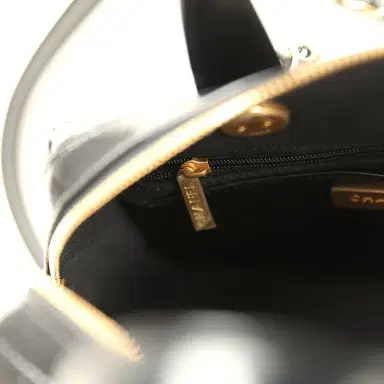 Chanel Pre-owned Chanel "CC Travel" Bowling Bag Black Shiny Crumped Calfskin Antique Gold Hardware | Thumbnail 12 Chanel Pre-owned Chanel "CC Travel" Bowling Bag Black Shiny Crumped Calfskin Antique Gold Hardware | Thumbnail 12
