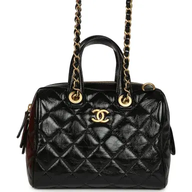 Chanel Pre-owned Chanel "CC Travel" Bowling Bag Black Shiny Crumped Calfskin Antique Gold Hardware | Thumbnail 1 Chanel Pre-owned Chanel "CC Travel" Bowling Bag Black Shiny Crumped Calfskin Antique Gold Hardware | Thumbnail 1