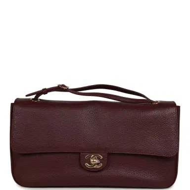 Chanel Chanel Maxi "Souplissimo" Small Flap Bag Burgundy Grained Calfskin Gold Hardware | Thumbnail 1 Chanel Chanel Maxi "Souplissimo" Small Flap Bag Burgundy Grained Calfskin Gold Hardware | Thumbnail 1