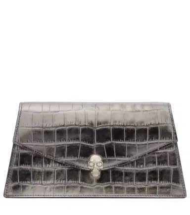 McQueen Skull Mini croc-effect leather clutch | Thumbnail 1 McQueen Skull Mini croc-effect leather clutch | Thumbnail 1