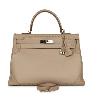 HERMÈS Pre-owned Hermes Ghillies Kelly Retourne 35 Argile Swift and Grain D'H Palladium Hardware | Thumbnail 1 HERMÈS Pre-owned Hermes Ghillies Kelly Retourne 35 Argile Swift and Grain D'H Palladium Hardware | Thumbnail 1