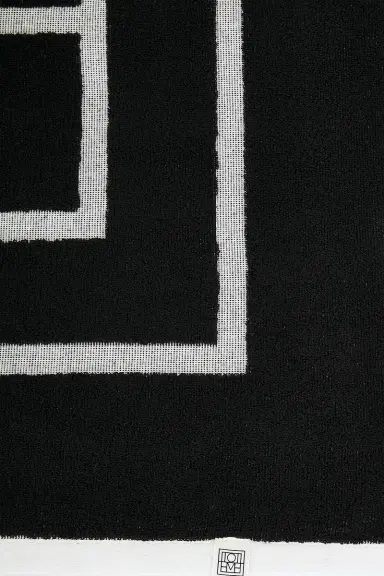 TOTEME Monogram Jacquard Beach Towel | Thumbnail 4 TOTEME Monogram Jacquard Beach Towel | Thumbnail 4