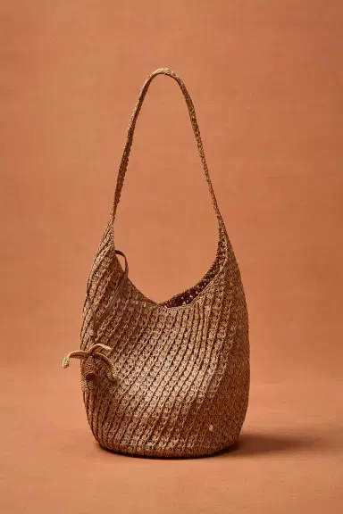 Helen Kaminski for FWRD Lani Raffia Crochet Bucket Bag With Palm Tree Charm | Thumbnail 5 Helen Kaminski for FWRD Lani Raffia Crochet Bucket Bag With Palm Tree Charm | Thumbnail 5