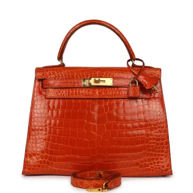 HERMÈS Vintage Hermes Kelly Sellier 28 Orange Shiny Porous Crocodile Gold Hardware | Thumbnail 1 HERMÈS Vintage Hermes Kelly Sellier 28 Orange Shiny Porous Crocodile Gold Hardware | Thumbnail 1