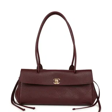 Chanel Chanel Small "Urban Essential" East West Shopping Tote Dark Burgundy Caviar Gold Hardware | Thumbnail 1 Chanel Chanel Small "Urban Essential" East West Shopping Tote Dark Burgundy Caviar Gold Hardware | Thumbnail 1