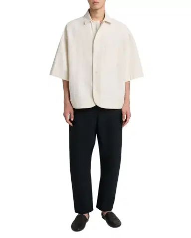 Jacquemus Men's Le Pantalon Cropped Curved-Leg Trousers | Thumbnail 1 Jacquemus Men's Le Pantalon Cropped Curved-Leg Trousers | Thumbnail 1