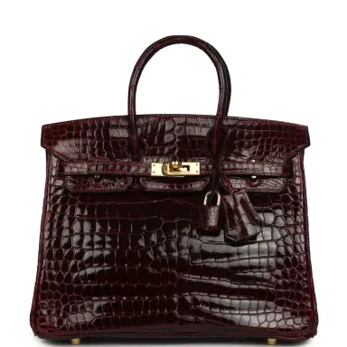 HERMÈS Vintage Hermes Birkin 25 Bordeaux Shiny Porosus Crocodile Gold Hardware | Thumbnail 1 HERMÈS Vintage Hermes Birkin 25 Bordeaux Shiny Porosus Crocodile Gold Hardware | Thumbnail 1
