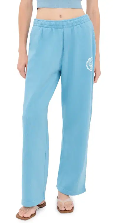 Sporty & Rich X Juicy Couture Emblem Wide Sweatpants ky Blue | Thumbnail 1 Sporty & Rich X Juicy Couture Emblem Wide Sweatpants ky Blue | Thumbnail 1