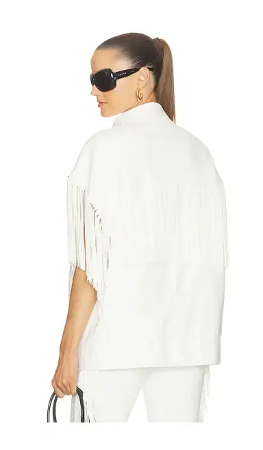 Norma Kamali Sleeveless Oversized Jean Jacket | Thumbnail 1 Norma Kamali Sleeveless Oversized Jean Jacket | Thumbnail 1
