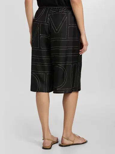 Toteme Women's Monogram Silk Pajama-Style Culottes - Black | Thumbnail 5 Toteme Women's Monogram Silk Pajama-Style Culottes - Black | Thumbnail 5