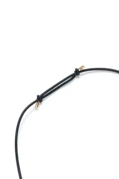 Gabriela Hearst Wheel of Fortune Pendant in 18K Yellow Gold (Black Leather Cord) | Thumbnail 4 Gabriela Hearst Wheel of Fortune Pendant in 18K Yellow Gold (Black Leather Cord) | Thumbnail 4