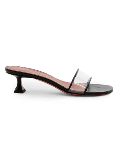 Amina Muaddi Women's Andreea Glass 45MM PVC & Leather Mules | Thumbnail 1 Amina Muaddi Women's Andreea Glass 45MM PVC & Leather Mules | Thumbnail 1