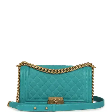 Chanel Pre-owned Chanel Medium Boy Bag Turquoise Shiny Caviar Antique Gold Hardware | Thumbnail 1 Chanel Pre-owned Chanel Medium Boy Bag Turquoise Shiny Caviar Antique Gold Hardware | Thumbnail 1