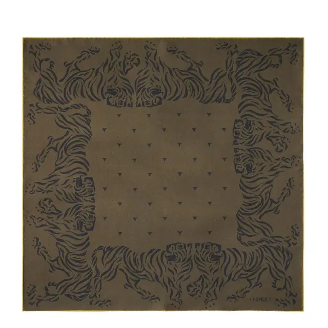 A square scarf featuring a stencil-effect print of A square scarf featuring a stencil-effect print of