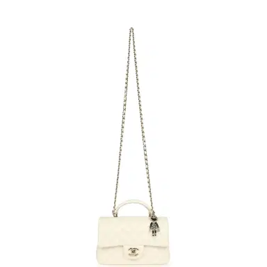 Chanel Chanel Mini Rectangular Flap Bag with Top Handle White Lambskin Light Gold Hardware | Thumbnail 7 Chanel Chanel Mini Rectangular Flap Bag with Top Handle White Lambskin Light Gold Hardware | Thumbnail 7