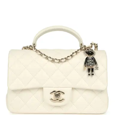 Chanel Chanel Mini Rectangular Flap Bag with Top Handle White Lambskin Light Gold Hardware | Thumbnail 1 Chanel Chanel Mini Rectangular Flap Bag with Top Handle White Lambskin Light Gold Hardware | Thumbnail 1