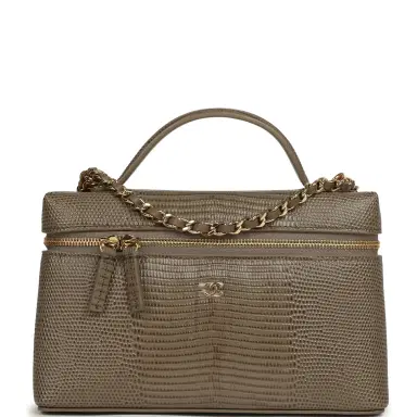 Chanel Chanel Top Handle Long Vanity Case with Chain Dark Khaki Lizard Embossed Calfskin Gold Hardware | Thumbnail 1 Chanel Chanel Top Handle Long Vanity Case with Chain Dark Khaki Lizard Embossed Calfskin Gold Hardware | Thumbnail 1