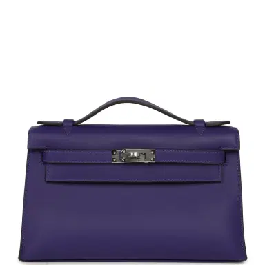 HERMÈS Hermes Kelly Pochette Purple Swift Palladium Hardware | Thumbnail 1 HERMÈS Hermes Kelly Pochette Purple Swift Palladium Hardware | Thumbnail 1