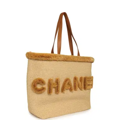 Chanel Chanel Coco Beach Maxi "Fluffy" Shopping Tote Light Beige Raffia and Calfskin Gold Hardware | Thumbnail 2 Chanel Chanel Coco Beach Maxi "Fluffy" Shopping Tote Light Beige Raffia and Calfskin Gold Hardware | Thumbnail 2