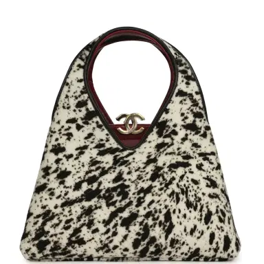 Chanel Chanel Small Chic Lady "Dalmatian Print" Shopping Bag Black, White Pony Hair Gold Hardware | Thumbnail 1 Chanel Chanel Small Chic Lady "Dalmatian Print" Shopping Bag Black, White Pony Hair Gold Hardware | Thumbnail 1
