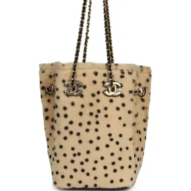 Chanel Chanel Mini "Cheetah Print" Bucket Bag with Chain Light Beige Calf Hair and Black Lambskin Gold Hardware | Thumbnail 4 Chanel Chanel Mini "Cheetah Print" Bucket Bag with Chain Light Beige Calf Hair and Black Lambskin Gold Hardware | Thumbnail 4