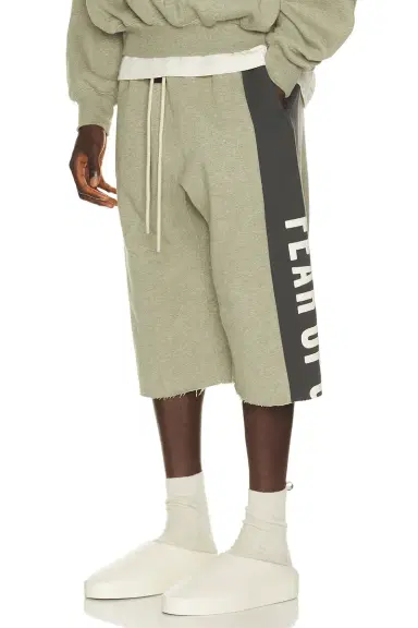Fear of God ESSENTIALS Panelled Undone Cut Off Sweatpant | Thumbnail 1 Fear of God ESSENTIALS Panelled Undone Cut Off Sweatpant | Thumbnail 1