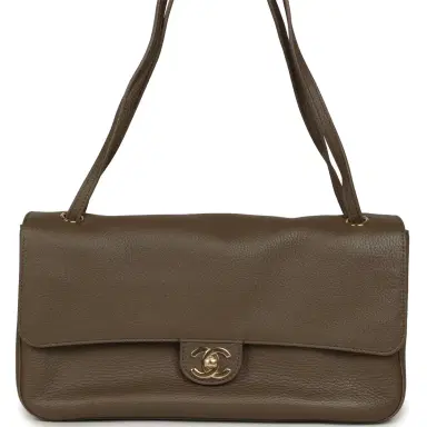 Chanel Chanel Maxi "Souplissimo" Small Flap Bag Brown Grained Calfskin Gold Hardware | Thumbnail 1 Chanel Chanel Maxi "Souplissimo" Small Flap Bag Brown Grained Calfskin Gold Hardware | Thumbnail 1