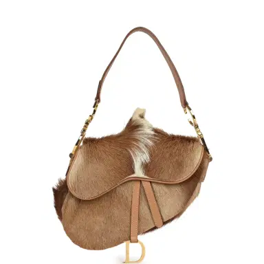 Dior Vintage Christian Dior Mini "Mohawk" Saddle Bag Light Brown, White Pony Hair Gold Hardware | Thumbnail 1 Dior Vintage Christian Dior Mini "Mohawk" Saddle Bag Light Brown, White Pony Hair Gold Hardware | Thumbnail 1