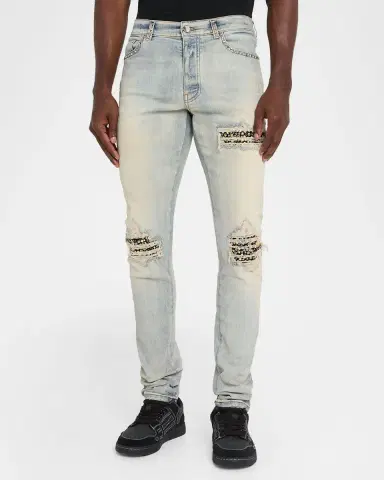 AMIRI Men's Studded Rip and Repair Black Denim Skinny Jeans | Thumbnail 4 AMIRI Men's Studded Rip and Repair Black Denim Skinny Jeans | Thumbnail 4