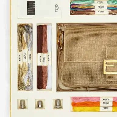 Fendi Iconic Baguette® bag made of perforated cotton | Thumbnail 2 Fendi Iconic Baguette® bag made of perforated cotton | Thumbnail 2