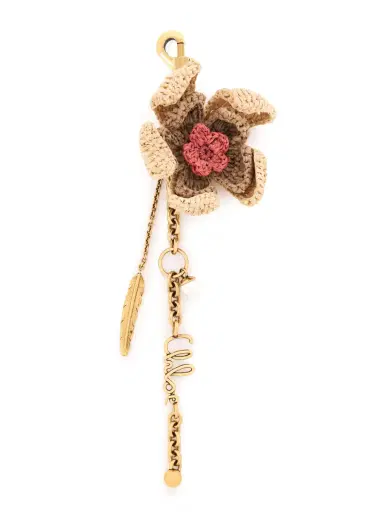 Chloé Chloé Symbols Flower bag charm in raffia & brass | Thumbnail 1 Chloé Chloé Symbols Flower bag charm in raffia & brass | Thumbnail 1
