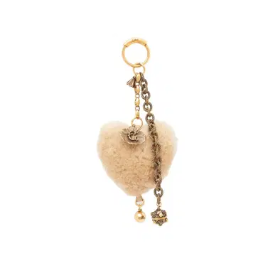 Chloé Chloé Symbols Heart Shearling bag charm in brass | Thumbnail 1 Chloé Chloé Symbols Heart Shearling bag charm in brass | Thumbnail 1