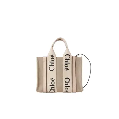Chloé Small Woody tote bag in linen | Thumbnail 1 Chloé Small Woody tote bag in linen | Thumbnail 1