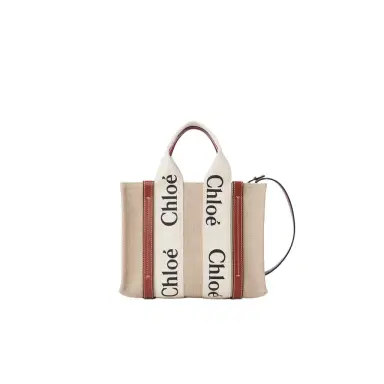 Chloé Small Woody tote bag in linen | Thumbnail 1 Chloé Small Woody tote bag in linen | Thumbnail 1