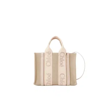 Chloé Small Woody tote bag in linen | Thumbnail 1 Chloé Small Woody tote bag in linen | Thumbnail 1