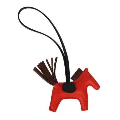 HERMÈS Hermes Rodeo Bag Charm PM Capucine, Terre, Black Milo Lambskin | Thumbnail 2 HERMÈS Hermes Rodeo Bag Charm PM Capucine, Terre, Black Milo Lambskin | Thumbnail 2