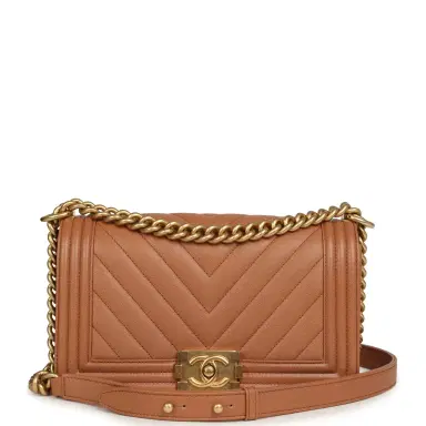 Chanel Pre-owned Chanel Medium Chevron Boy Bag Brown Caviar Antique Gold Hardware | Thumbnail 1 Chanel Pre-owned Chanel Medium Chevron Boy Bag Brown Caviar Antique Gold Hardware | Thumbnail 1