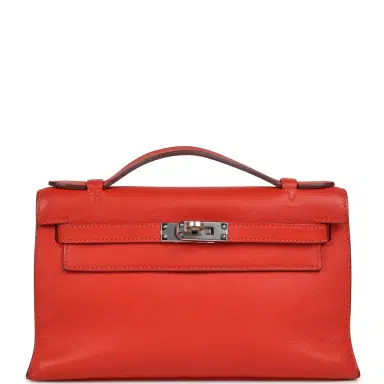 HERMÈS Pre-owned Hermes Kelly Pochette Capucine Swift Palladium Hardware | Thumbnail 1 HERMÈS Pre-owned Hermes Kelly Pochette Capucine Swift Palladium Hardware | Thumbnail 1