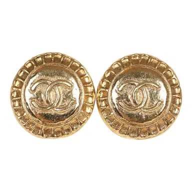 Chanel Vintage Chanel Small Round Sun Border CC Clip On Earrings Gold Plated Hardware | Thumbnail 1 Chanel Vintage Chanel Small Round Sun Border CC Clip On Earrings Gold Plated Hardware | Thumbnail 1