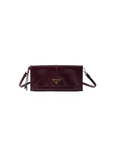 Prada Women's Leather Wallet with Shoulder Strap - Dark Red | Thumbnail 1 Prada Women's Leather Wallet with Shoulder Strap - Dark Red | Thumbnail 1