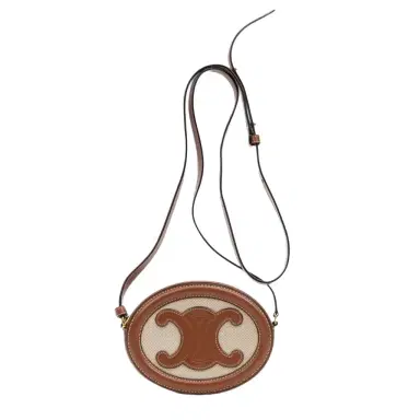 Celine Celine Brown & Beige Woven Canvas Triomphe Mini Oval Crossbody Bag by The Solist | Thumbnail 1 Celine Celine Brown & Beige Woven Canvas Triomphe Mini Oval Crossbody Bag by The Solist | Thumbnail 1