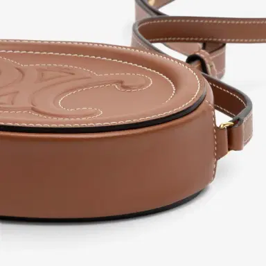 Celine Celine Brown Smooth Leather Triomphe Mini Oval Crossbody Bag by The Solist | Thumbnail 7 Celine Celine Brown Smooth Leather Triomphe Mini Oval Crossbody Bag by The Solist | Thumbnail 7