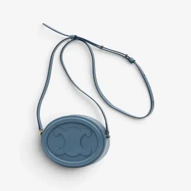 Celine Celine Triomphe Light Blue Smooth Leather Mini Oval Crossbody Bag by The Solist | Thumbnail 2 Celine Celine Triomphe Light Blue Smooth Leather Mini Oval Crossbody Bag by The Solist | Thumbnail 2