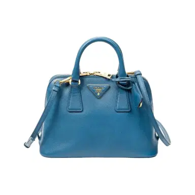 Prada Prada Blue Saffiano Leather Small Zip Promenade Bag by The Solist | Thumbnail 1 Prada Prada Blue Saffiano Leather Small Zip Promenade Bag by The Solist | Thumbnail 1