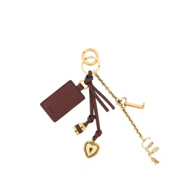Chloé Chloé Symbols Heart & Lock key ring bag charm in brass & leather | Thumbnail 1 Chloé Chloé Symbols Heart & Lock key ring bag charm in brass & leather | Thumbnail 1