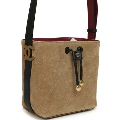 Chanel Chanel "CC Loop" Bucket Bag with Leather Strap Dark Beige Suede, Black Leather Gold Hardware | Thumbnail 2 Chanel Chanel "CC Loop" Bucket Bag with Leather Strap Dark Beige Suede, Black Leather Gold Hardware | Thumbnail 2