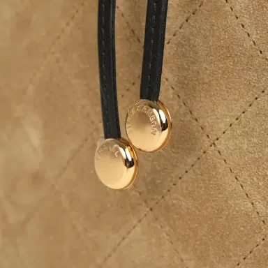 Chanel Chanel "CC Loop" Bucket Bag with Leather Strap Dark Beige Suede, Black Leather Gold Hardware | Thumbnail 8 Chanel Chanel "CC Loop" Bucket Bag with Leather Strap Dark Beige Suede, Black Leather Gold Hardware | Thumbnail 8