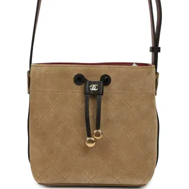 Chanel Chanel "CC Loop" Bucket Bag with Leather Strap Dark Beige Suede, Black Leather Gold Hardware | Thumbnail 1 Chanel Chanel "CC Loop" Bucket Bag with Leather Strap Dark Beige Suede, Black Leather Gold Hardware | Thumbnail 1