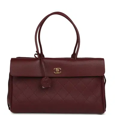 Chanel Chanel Large "Urban Essential" East West Shopping Tote Dark Burgundy Caviar Gold Hardware | Thumbnail 1 Chanel Chanel Large "Urban Essential" East West Shopping Tote Dark Burgundy Caviar Gold Hardware | Thumbnail 1